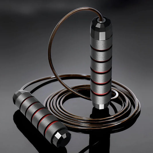 Adjustable speed jump rope with ergonomic handles