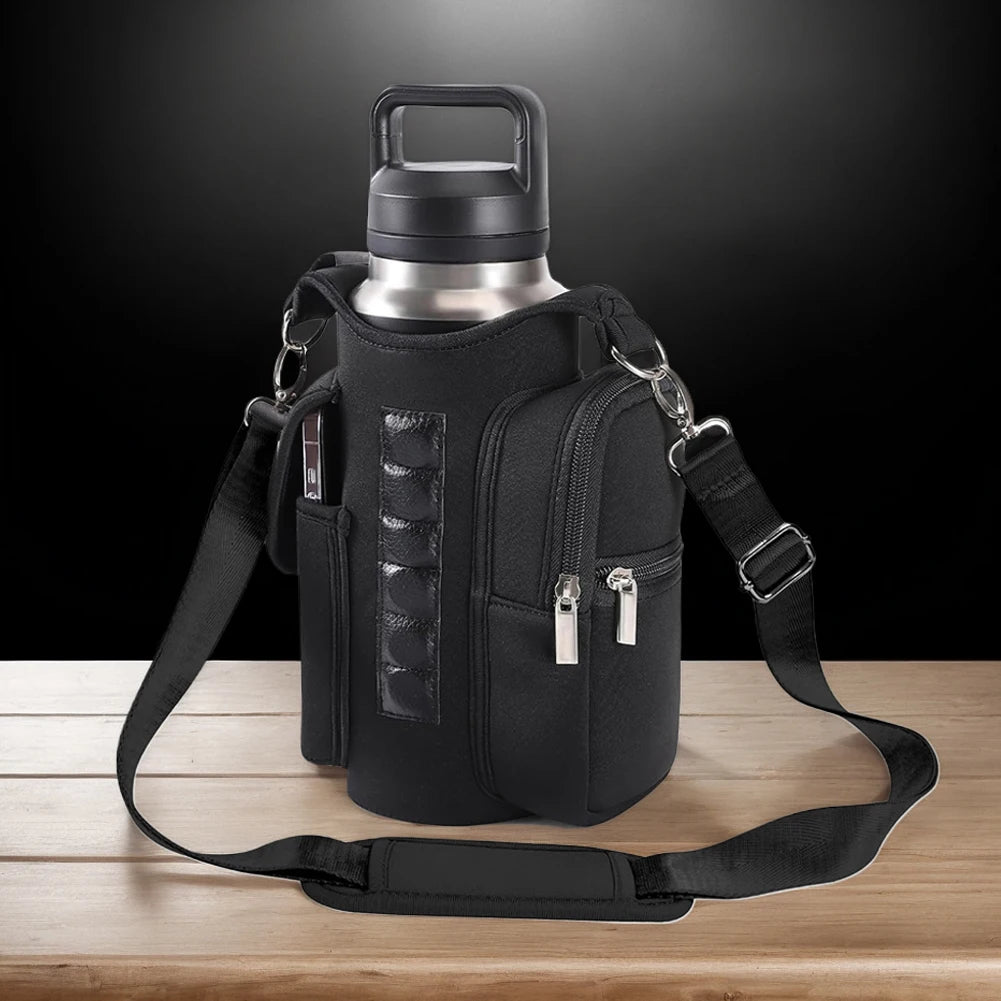 Large water bottle secured in magnetic gym bag central compartment fitting 18-40 oz bottles